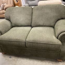 Green Loveseat W/ Rainbow Stitching