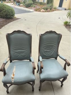 Vintage carved captain chairs (pair)