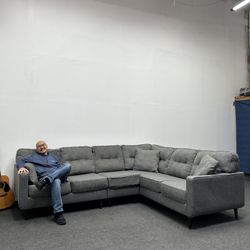 Mid-century modern Ashley Charcoal Gray 3-piece Sectional Couch. 108"x 88". We Deliver & set up