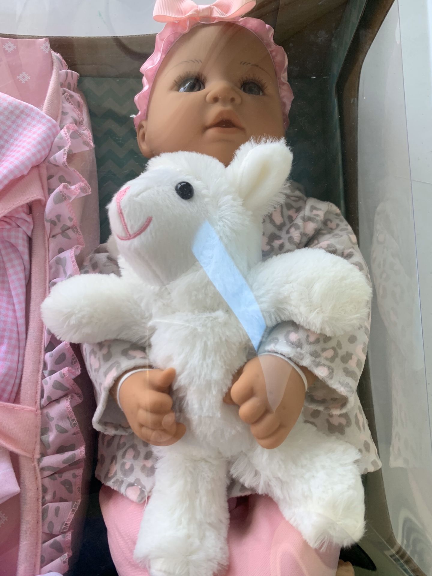 BABY EMMA DOLL NEW WITH BROWN EYES .