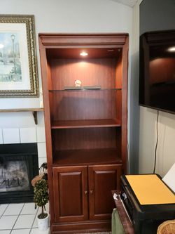 Tall Cherry Display Cabinet / Bookcase with Glass Shelf & Built-In Light – $100