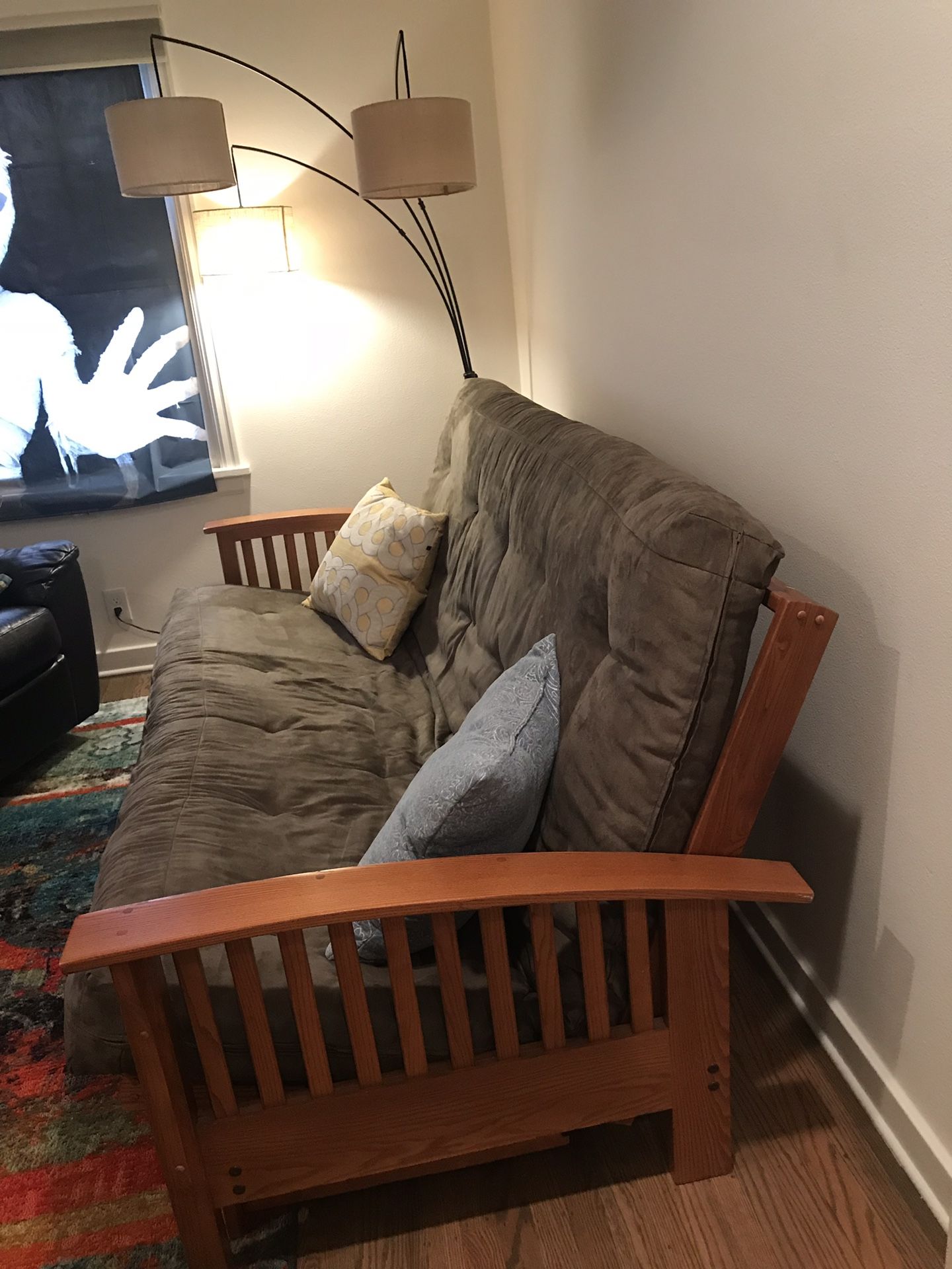 Norka futon with queen sized mattress and bottom storage