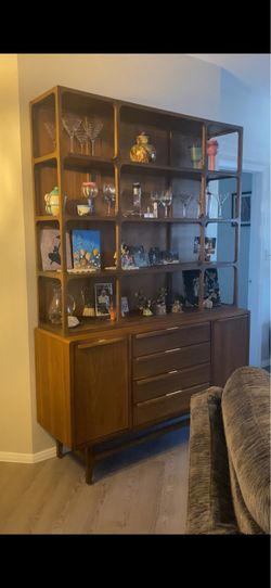 Wood dining room cabinet with shelves