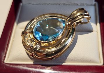14k yellow gold pendant with aquamarine and diamonds