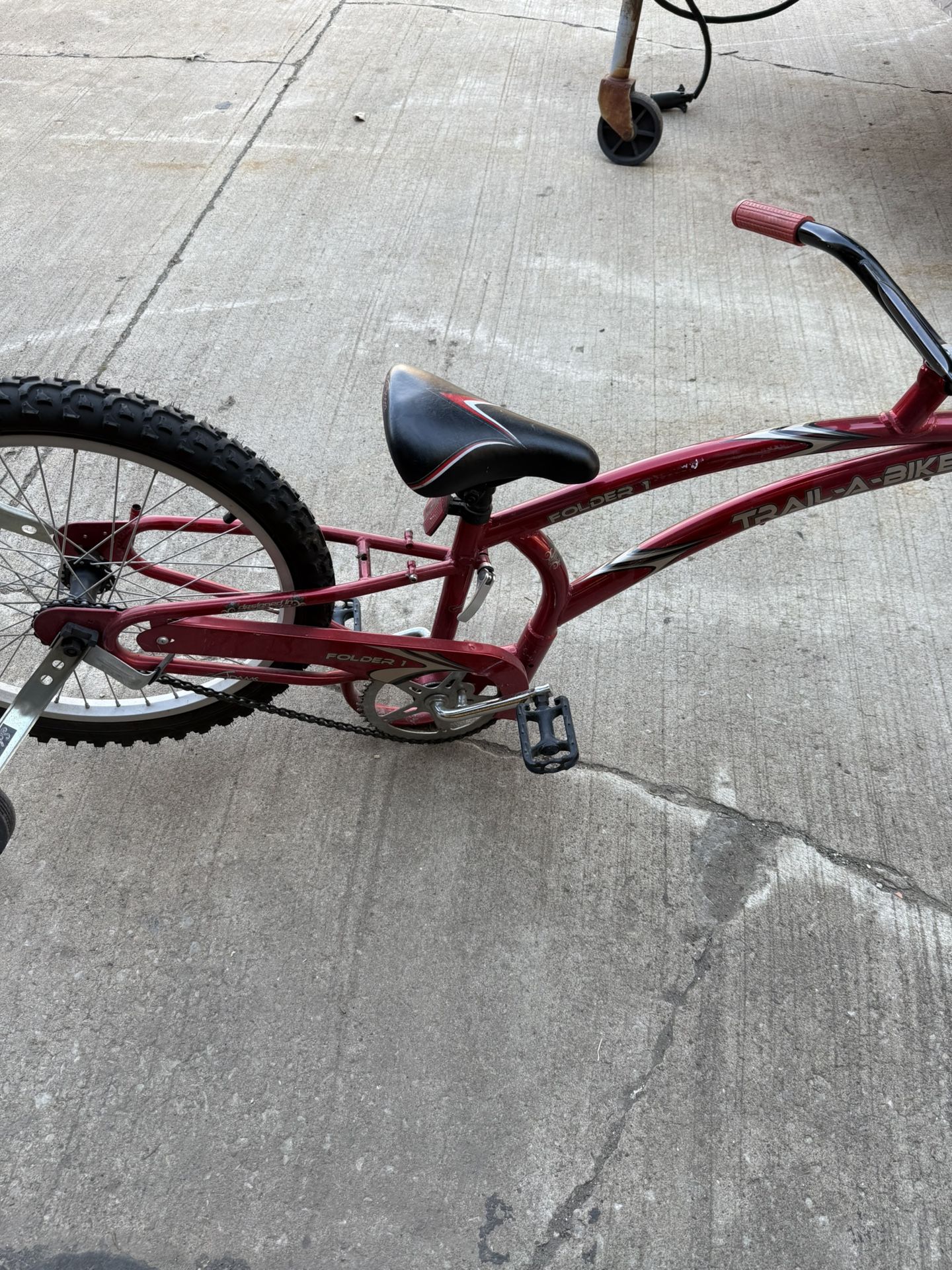 Kids Ride Behind Bike