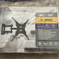 Full Motion TV Wall Mount 32”–55”, adjustable tilt, new in box.
