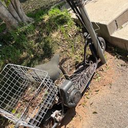  vintage gas-powered stand-up/seated scooter