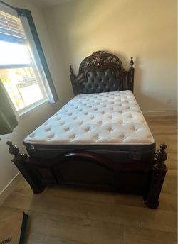 Brown Wood Bed Detailing and Antique Style