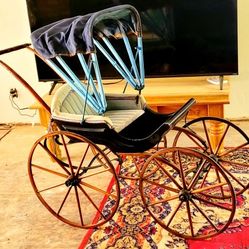 Antique Victorian-era baby carriage or pram