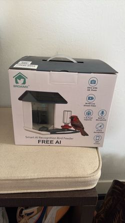 Remote controlled bird feeder