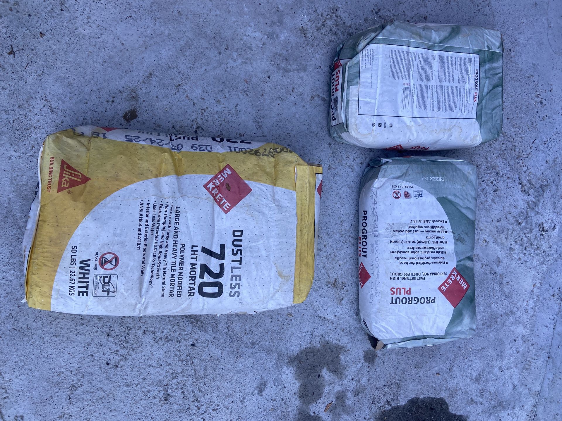 White mortar (50lbs) And Nat Grey grout (50lbs)