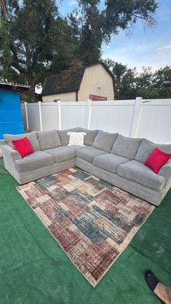 Nice L-shaped sectional sofa of cozy Gray color for your home can be delivered for an additional cost Price 350