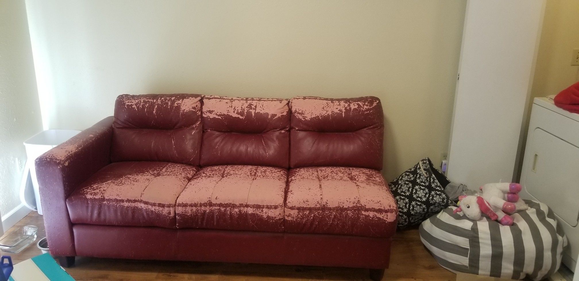 Free couch SO comfy, but material is peeling off