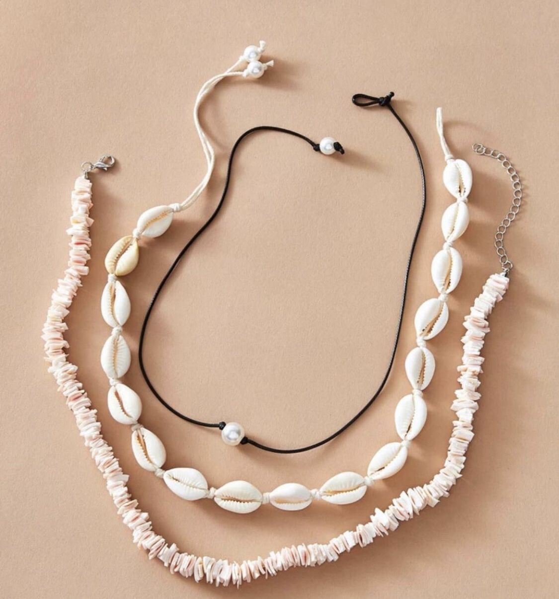 jewelry set : shell necklace, pearl bead, and another shell necklace