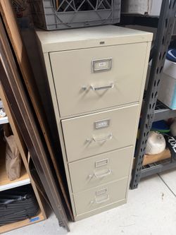 4-Drawer Metal Filing Cabinet – Heavy Duty – Works Great  Price: $80 OBO  ⸻  Description: Solid 4-drawer metal filing cabinet in good condition. All d