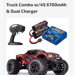 Traxxas X-maxx  (Copy This Link Below And Watch The Beast For Your Self On YouTube)