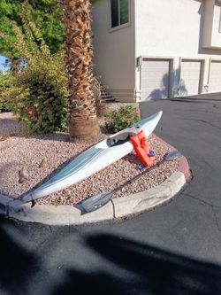 White used Kayak with steer, and life-vest $200