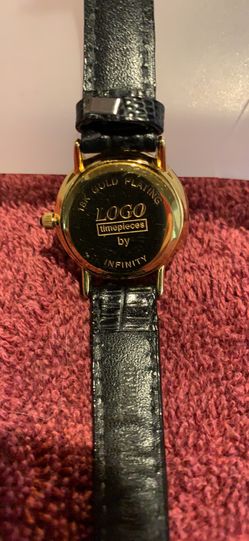 LOGO TIMEPIECE BY INFINITY 18K GOLD PLATED. 1990’S