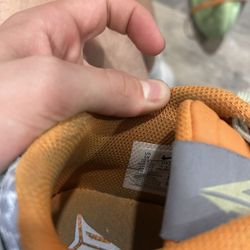 Nike ja 1 mismatched orange and green 5