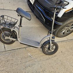 Go Flex Electric Scooter With a Seat And Basket 