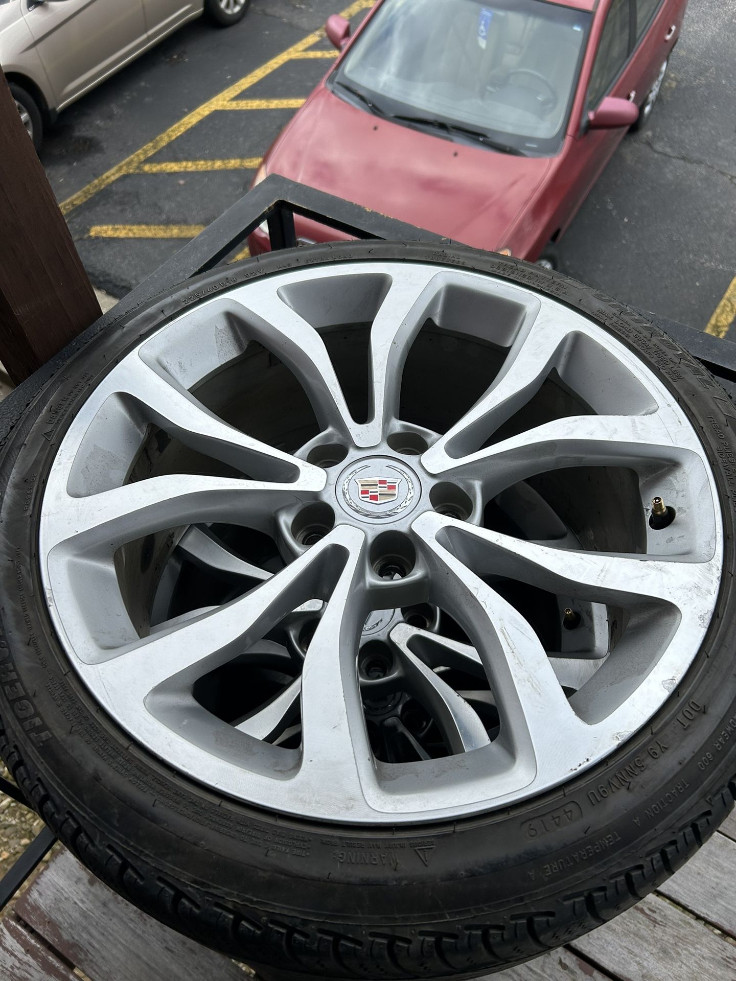 removed)-245 R 4018 inch Cadillac ATS rims and tires firm $1(contact info removed) for the set tires still like New