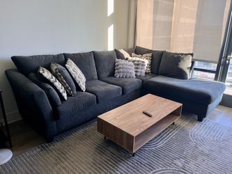 2 Piece Sectional  W/accent pillows and coffee table
