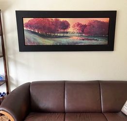 Large panoramic landscape wall art in a custom black gallery frame.