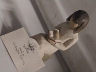 This is a Willow Tree "Wisdom" figurine, model number 26122, sculpted by Susan Lordi for DEMDACO.