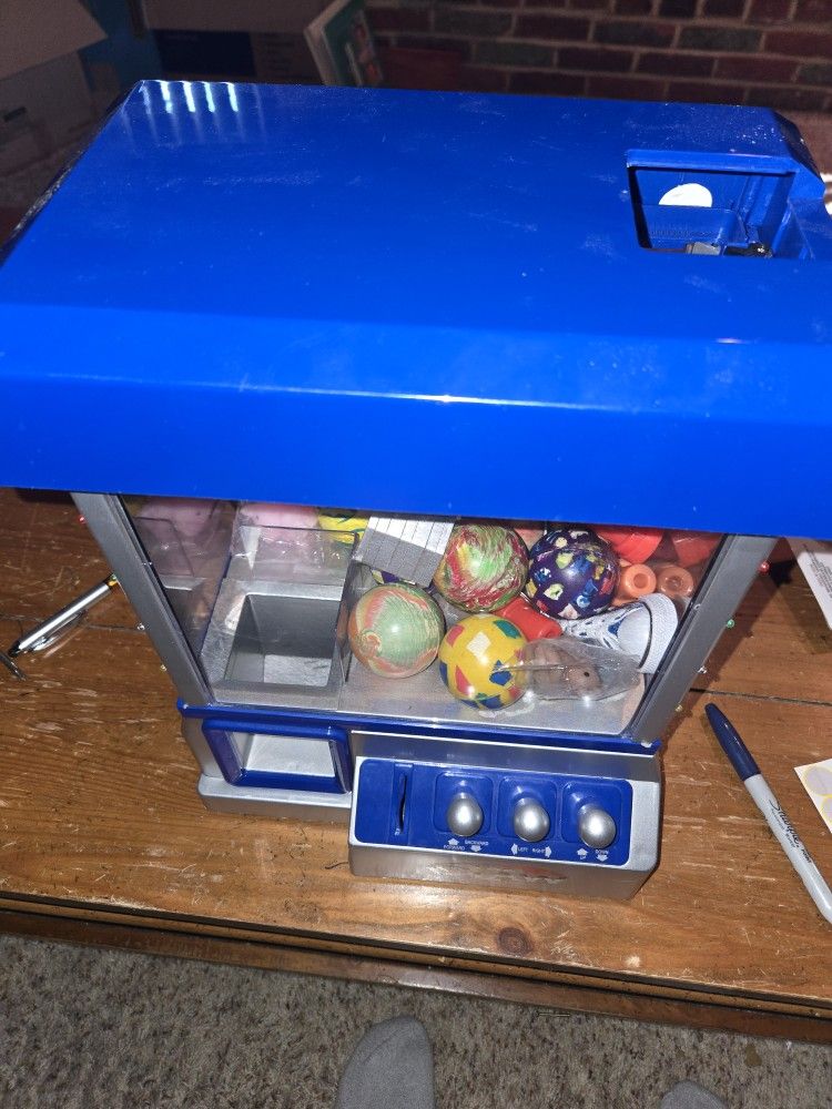 Children's Claw Machine With Some Items