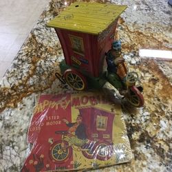 Antique Humphrey Mobile Tin Toy
