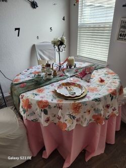Round table with 4 wood chairs