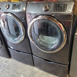 Samsung Front Loading Washer And Stackable Gas Dryer Set With Pedestals 