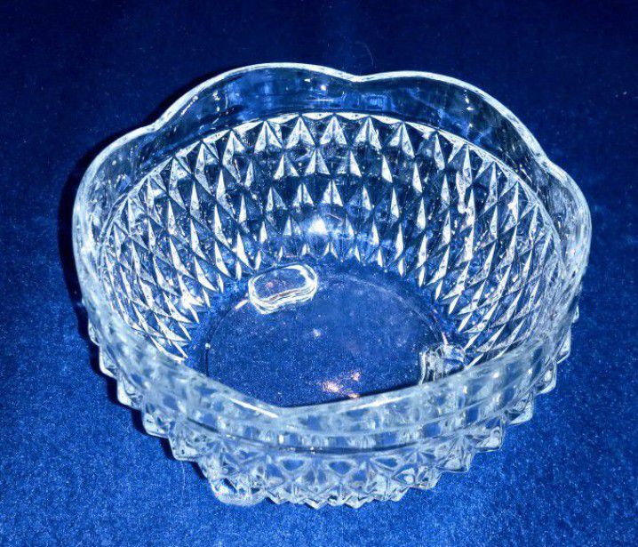Indiana Glass Diamond Point Clear pattern clear glass crystal three footed candy or nut dish with a scalloped rim

