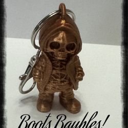 Copper Colored Skeleton Wearing A Hoodie Keychain Purse Clip
