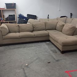 Large brown sectional couch