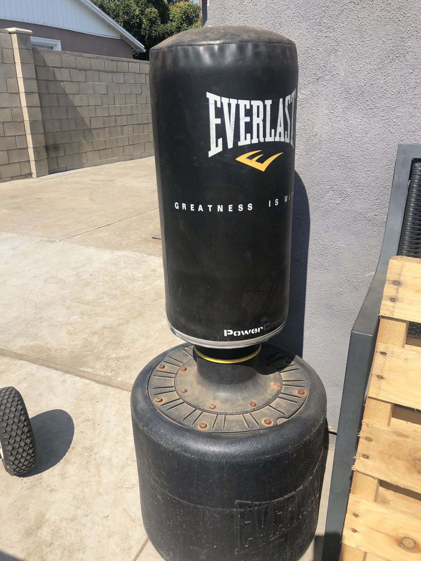 Punching bag and outside bar chairs