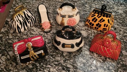 7 Ceramic decorative purses for $75