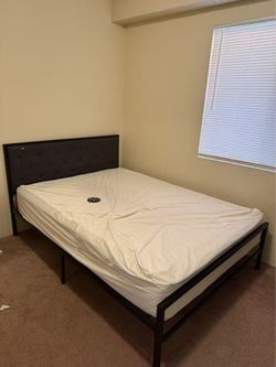 Full size bed with spring mattress