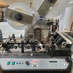 Ameritek 2000 Series tabbing and labeling machine (also known as the Secap T2000)