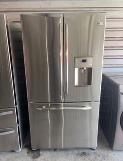 GE Stainless Steel Refrigerator And Freezer