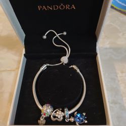 Pandora Bracelet and 3 charms! Hardly ever worn. Maybe 3 times. Also for sale Kay's jewelers Star Wars collection baby Yoda necklace barely worn. 
