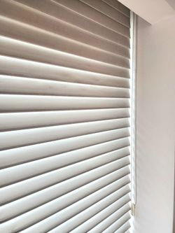 Blinds 9'10" wide. Rolling blinds. Hunter Douglas