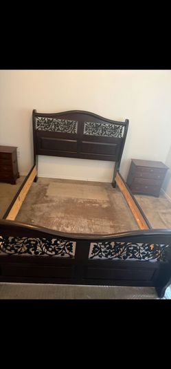 Dark Wood Bed Frame with Floral Detail