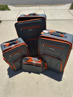 Gray/orange Rockland 4 piece luggage set