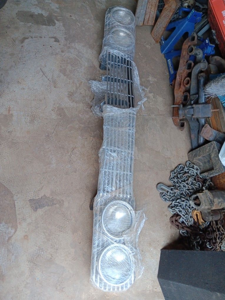 64 Chevy Impala Grill And Brackets And Head Light Buckets