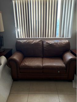 Brown leather Couches