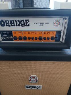 Orange amp head with cabinet