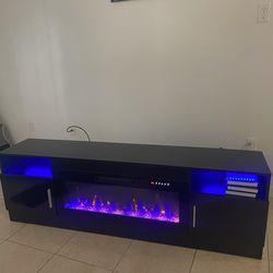 Tv stand with fire place aesthetic