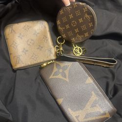 Louis Vuitton Trio Monogram Pouch