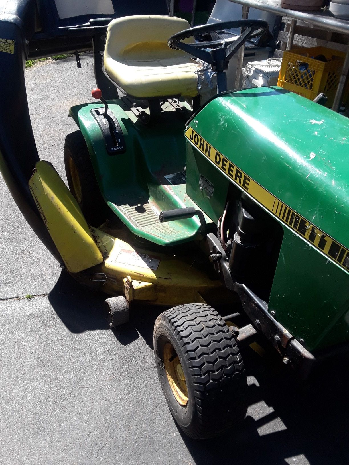 John Deere riding mower, needs front tire, starter and possibly a battery $ 175 as is